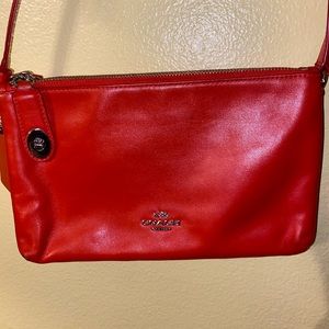 Burnt orange Coach crossbody purse